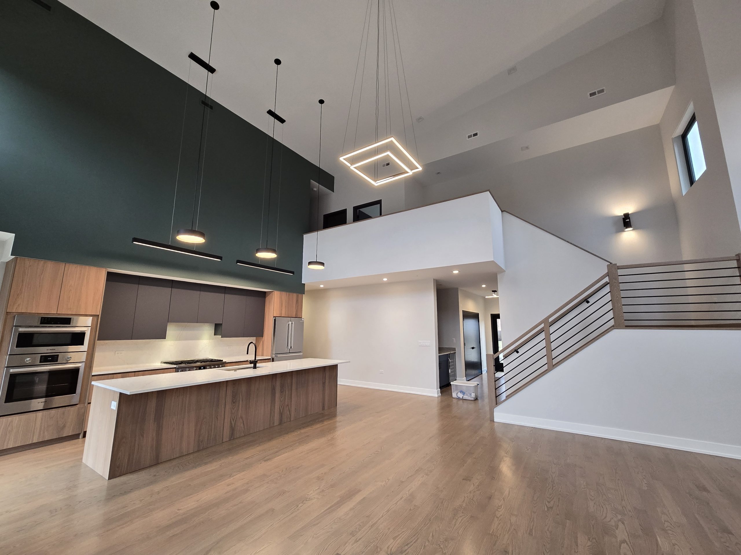 Modern kitchen with high ceilings.